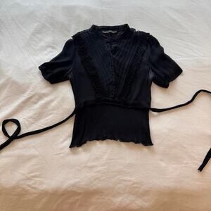 Beautiful black silk blouse with ruffles